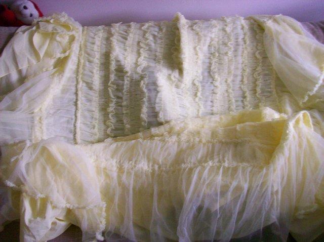 Preview of the first image of 1 Retro yellow nylon single bedspread.