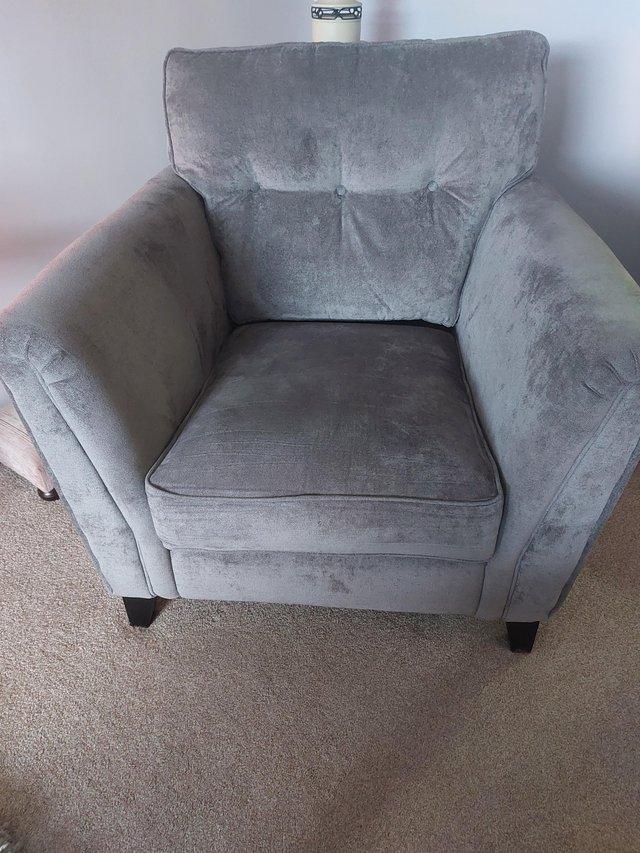Preview of the first image of Pair of lounge medium gray chairs with hardwood legs.