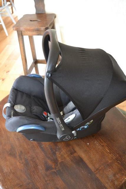 Preview of the first image of Maxi Cosi made in Netherlands baby car seat with hood 0-13kg.