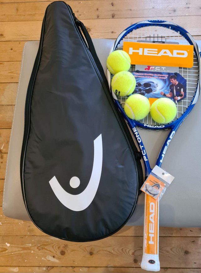Preview of the first image of Head tennis racket with 4 new tennis balls and case.