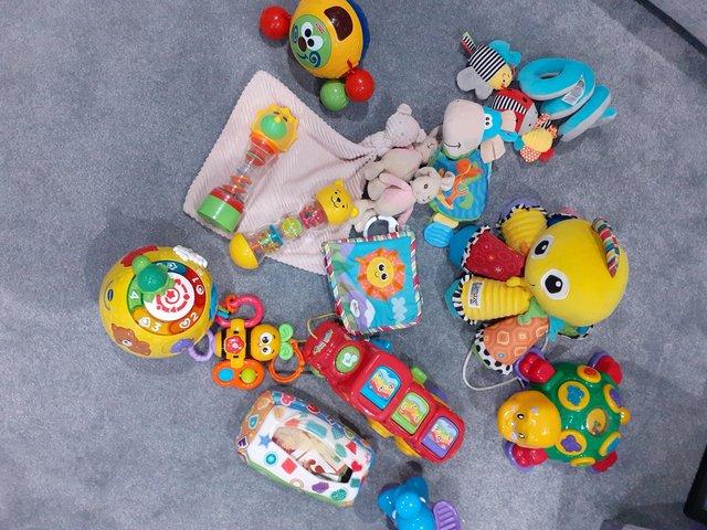 Preview of the first image of Several Baby toys including Lamaze Octopus.