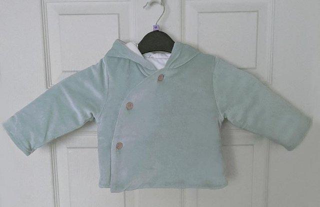 Preview of the first image of Cute Babies Blue Velour Hooded Jacket (6-9 Months) By TU.