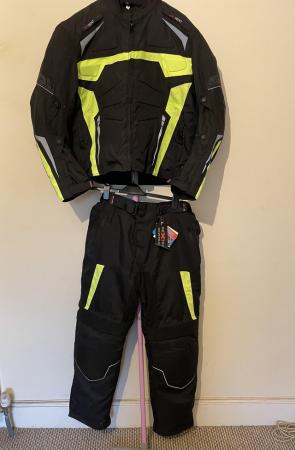 Image 1 of Black and neon yellow padded motorcycle jacket and trousers