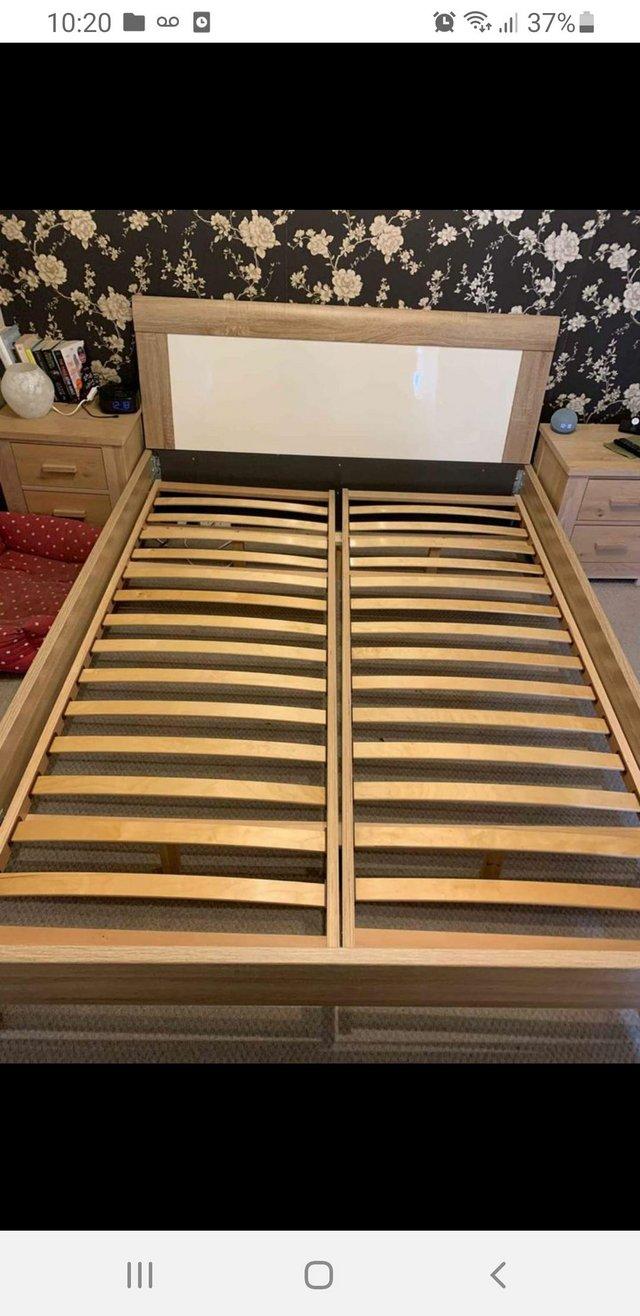 Preview of the first image of Bensons designer wooden King size bed frame.