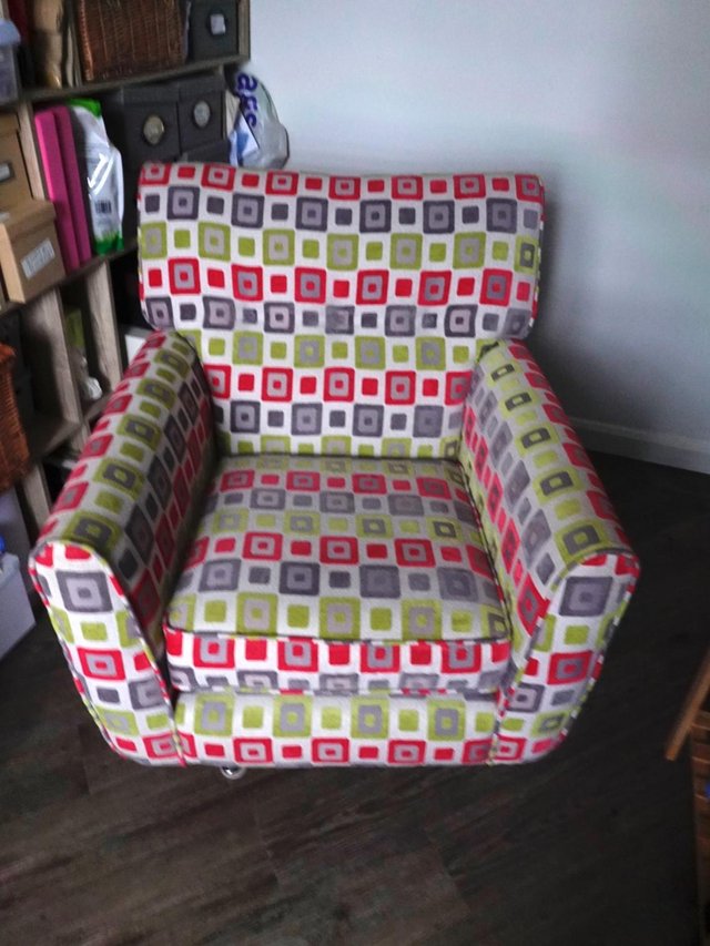 Preview of the first image of Contemporary Swivel colourful Arm chair.
