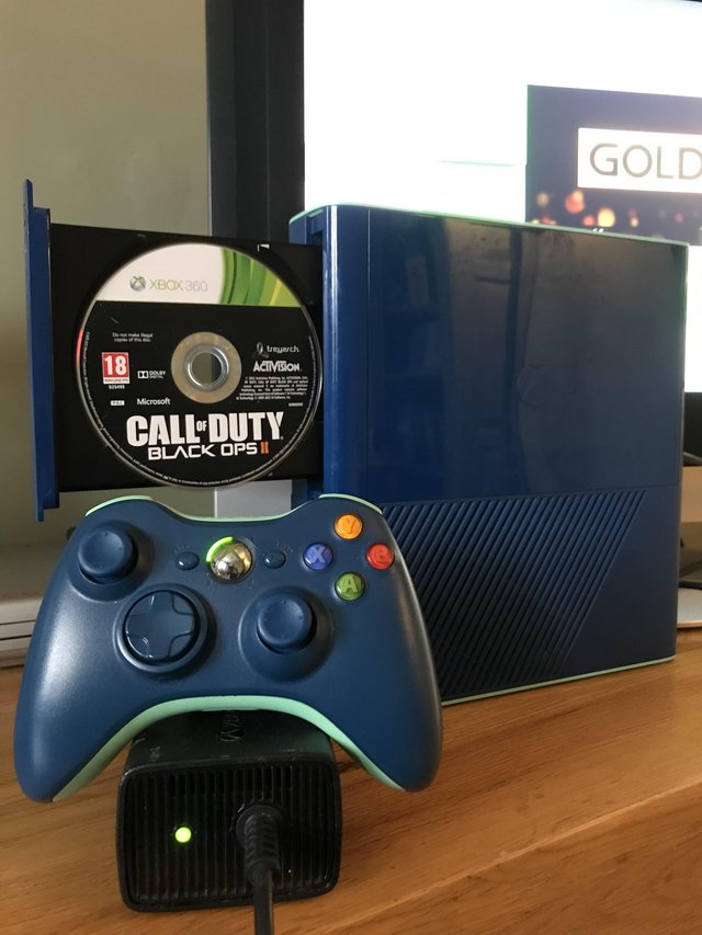 Preview of the first image of Microsoft Xbox 360 Slim 'E' Limited Edition Blue Console.