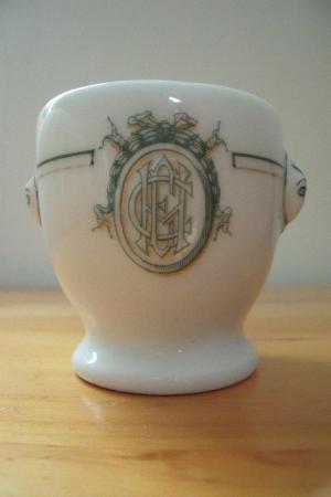 Image 1 of A Hache & Cie (Paris) white ceramic egg-cup shape pot.