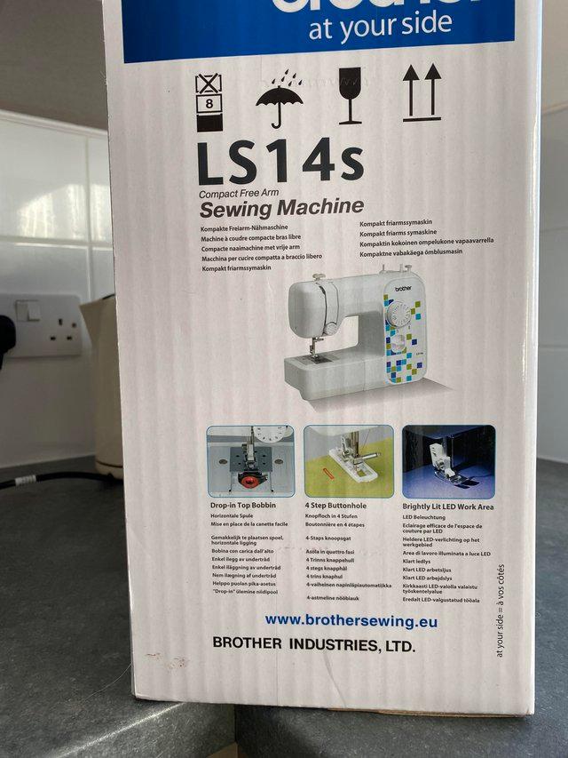 Preview of the first image of Sewing Machine New in box LS14s.