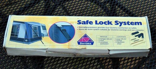 Preview of the first image of Dorema  Safe Lock System - awning tie down kit.