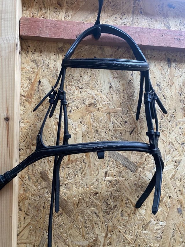 Preview of the first image of Pony bridle, black leather, brand new.