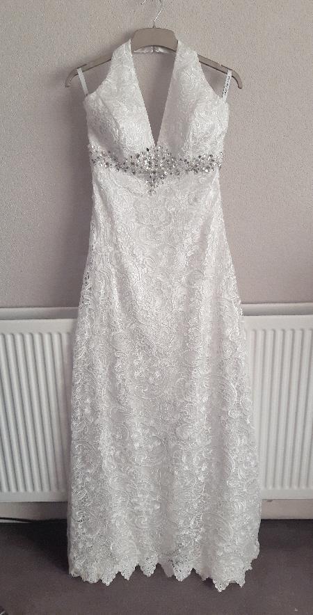 Preview of the first image of Ivory Lace Fitted Wedding Gown By Eternity Bride - Size 12.