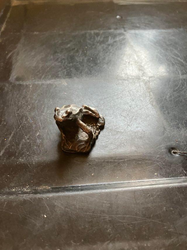 Preview of the first image of Small frog metal figurine in good condition.