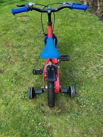 Image 3 of Paw Patrol bike with stabilisers. 12”