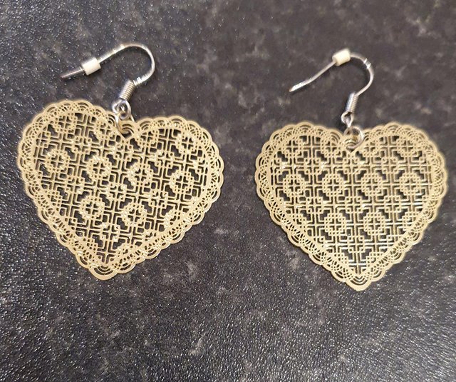 Preview of the first image of Gold colour heart drop earrings, new & unworn..
