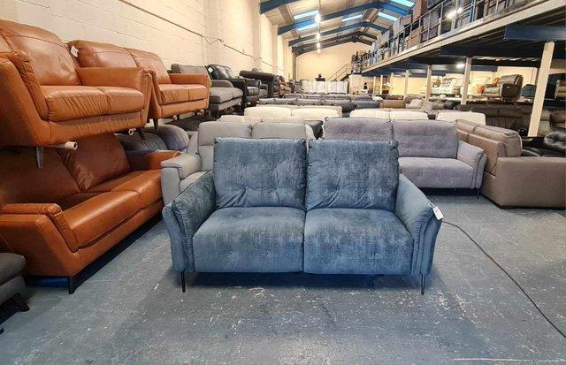 Preview of the first image of Bolzano blue fabric electric recliner 2 seater sofa.