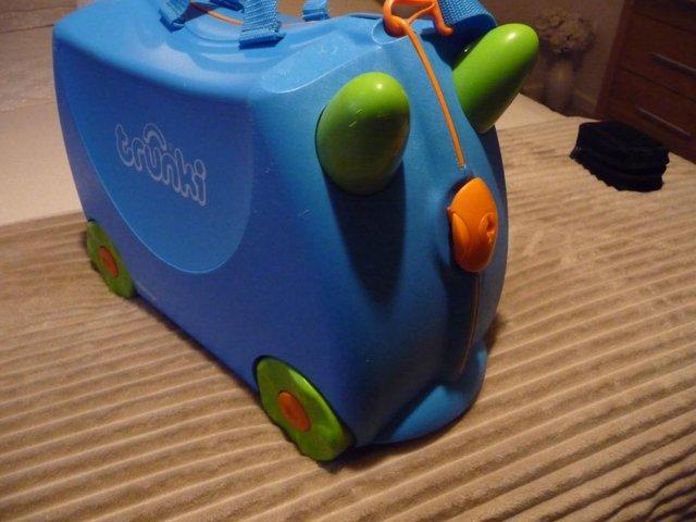 Preview of the first image of terence trunki childs ride on suitcase.