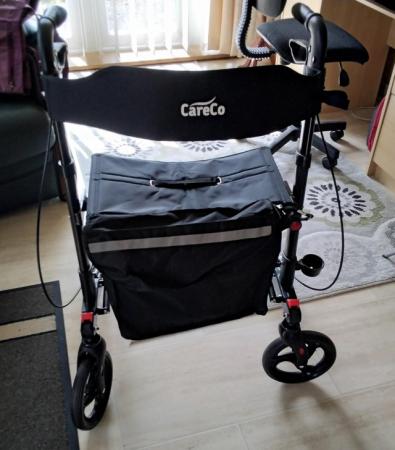 Image 2 of 4 wheeled rollator, good condition.