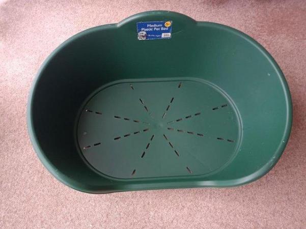 Image 4 of Large grey plastic and medium size green dog bed