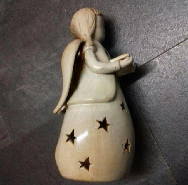 Preview of the first image of CERAMIC ANGEL TEA LIGHT/CANDLE HOLDER.