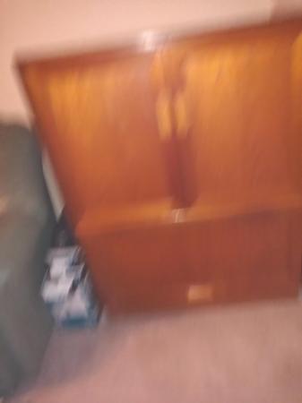 Image 1 of solid Wooden TV Cabinet with shelves at the bottom back cold