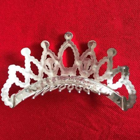 Image 2 of Mini tiara hair comb in silver coloured plastic.