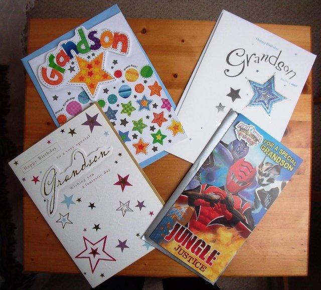 Preview of the first image of 4 unused Grandson birthday cards + envelopes. £1 ea/£3 lot..