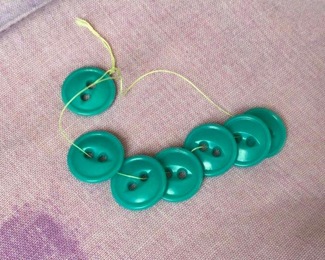Preview of the first image of Set of 7 NEW turquoise green buttons.