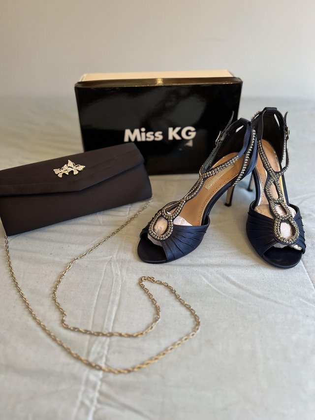 Preview of the first image of Diamanté Navy dress shoes Kurt Geiger and bag size 4.