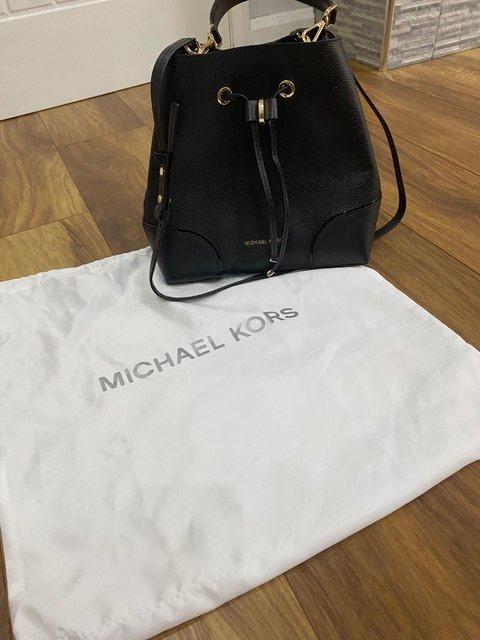 Preview of the first image of Michael Kors Black Leather Bag.
