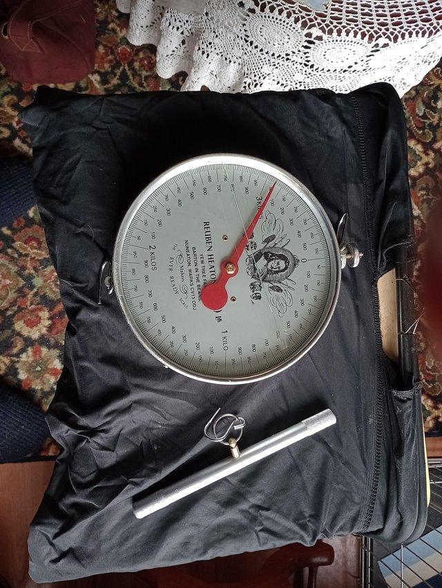 Preview of the first image of Fish weighing scales with holding nets.