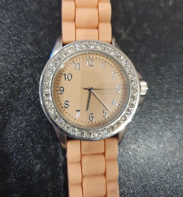 Preview of the first image of Nude/peach diamanté face watch.