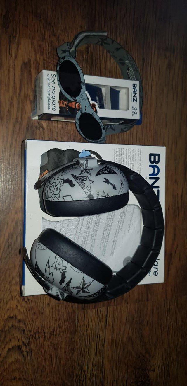 Preview of the first image of Banz sunglasses and ear defenders.