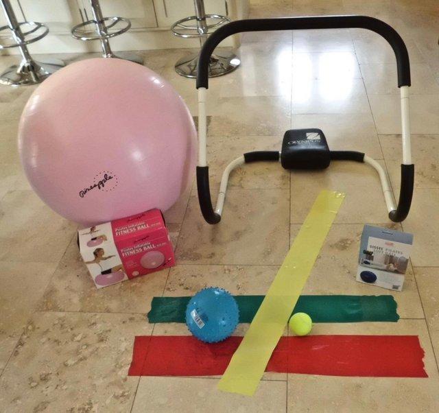 Preview of the first image of A HOME MINI-GYM: PILATES BALLS, EXERCISE FRAME ETC..