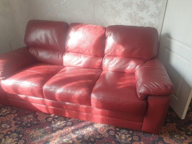 Preview of the first image of Red Leather Sofa and Armchair.