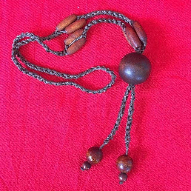 Preview of the first image of Necklace, wooden beads & cord..