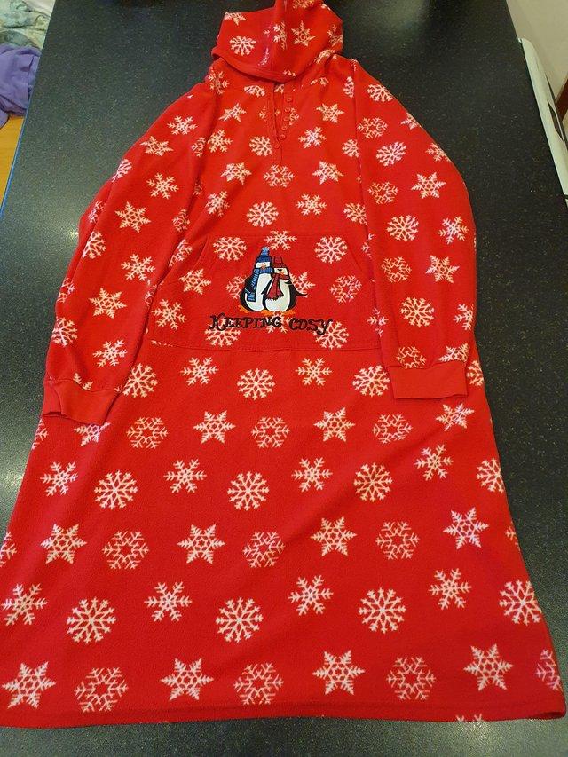 Preview of the first image of Red penguin snowflake sleep oodie size 16.