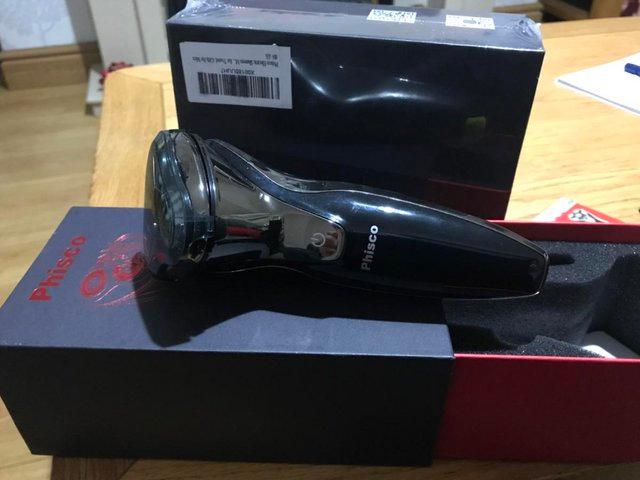 Preview of the first image of Men’s electric shaver. Brand new, sealed box.