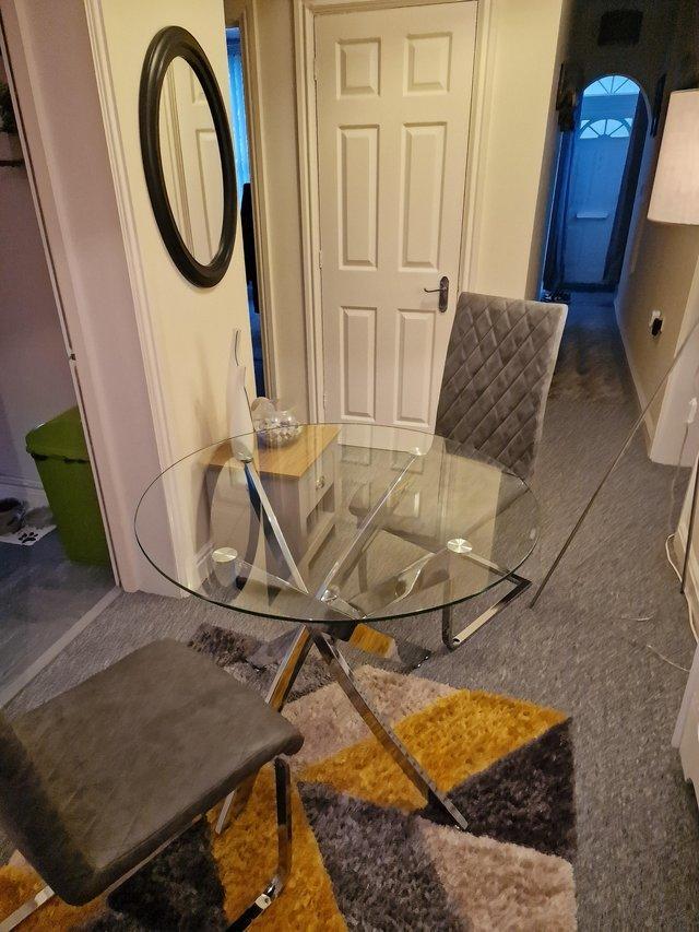 Preview of the first image of Dining glass table and two chairs plus 2 bar stools.