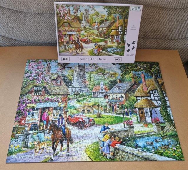 Preview of the first image of 1000 piece jigsaw called FEEDING THE DUCKS by THOP..