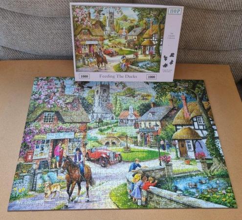 Image 1 of 1000 piece jigsaw called FEEDING THE DUCKS by THOP.