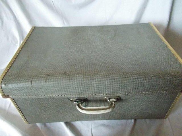 Preview of the first image of 1950s Ladies weekend suitcase, rare side hinged, with key.