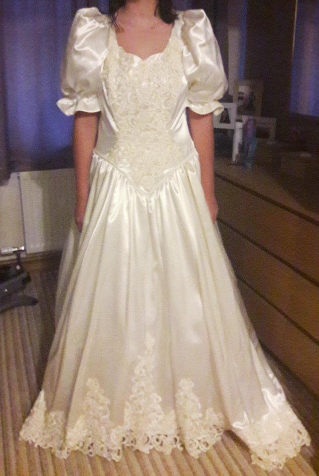 Preview of the first image of Handmade wedding dress approx size 16.