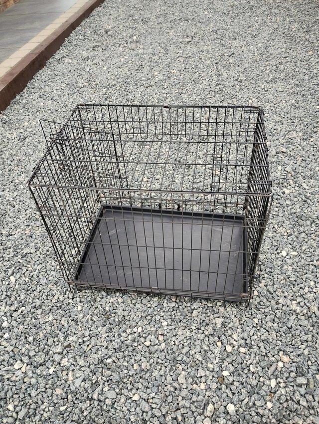 Preview of the first image of Dog cage ideal for smal medium sized dog.