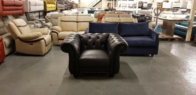 Preview of the first image of New Bakerfield chesterfield black leather armchair.