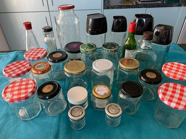 Preview of the first image of 70 Assorted jars and bottles for craft or storage.