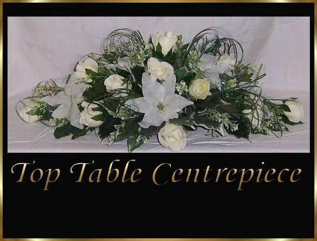 Preview of the first image of 1 Kelly Ivory Wedding Flowers Top Table Decoration.