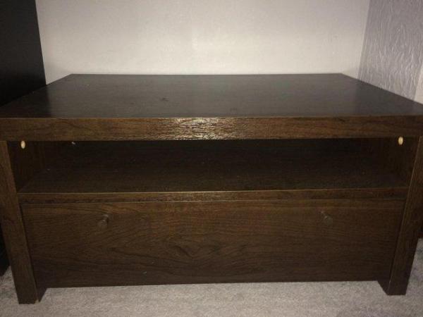 Image 1 of Brown wood tv stand with one large drawer