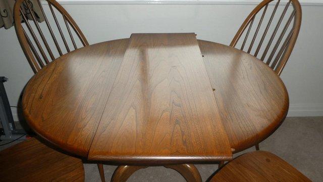 Image 1 of Ercol Dining table & Chairs, golden dawn finish