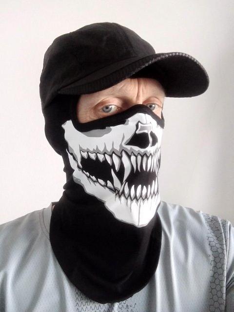 White skull full face mask with black baseball cap. - £18 each