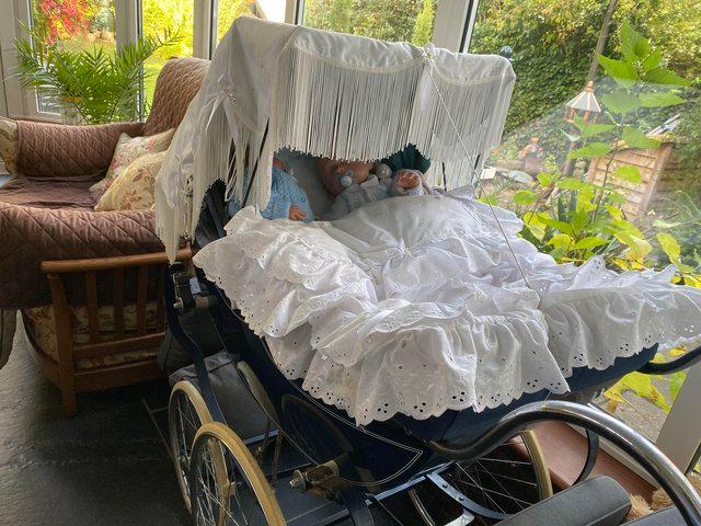 Preview of the first image of Beautiful Osnath Coach built pram with quilt and canopy.